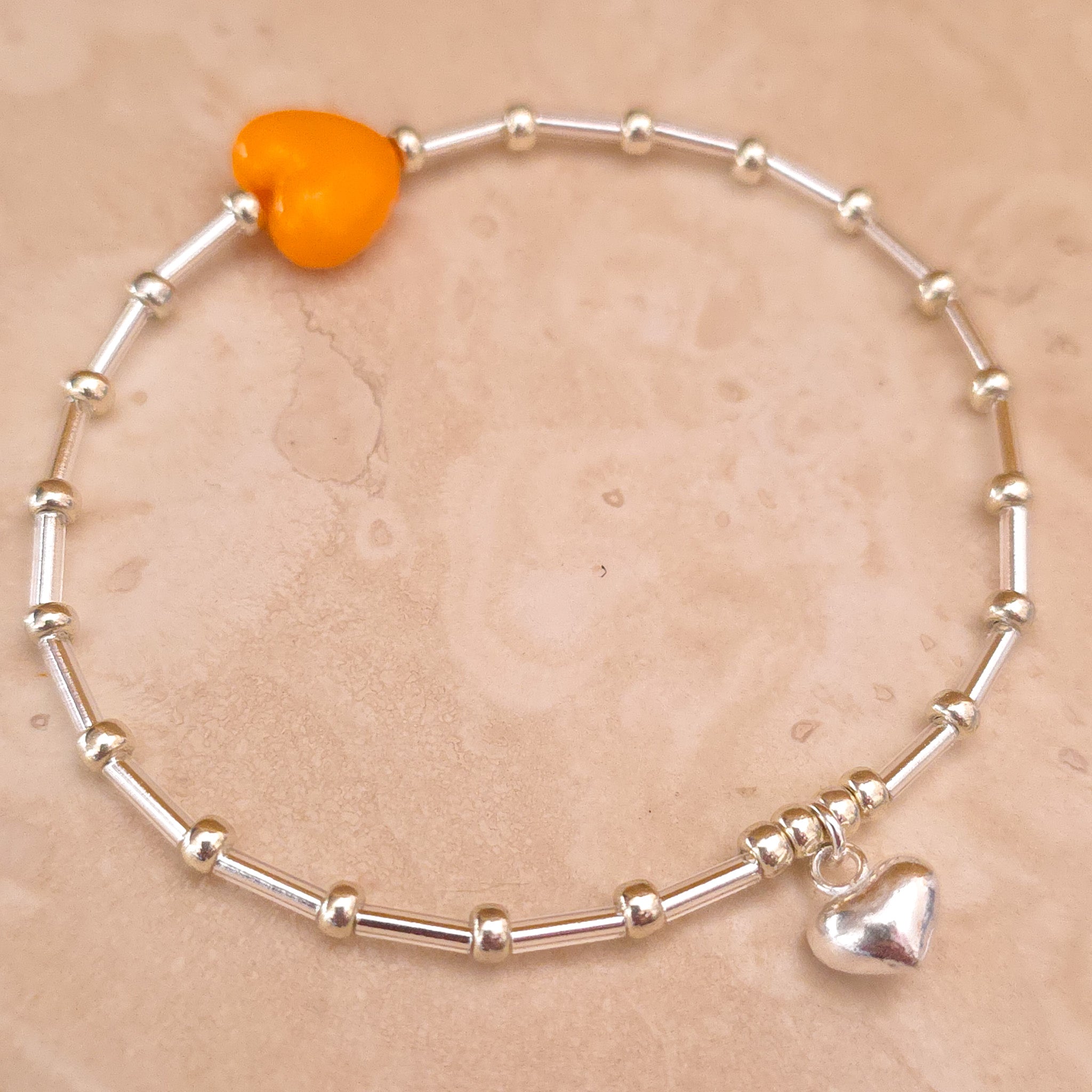 Mila Orange silver